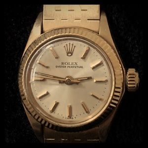 18k gold Rolex Oyster Perpetual 1970s watch.